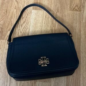 Tory Burch Blue Pebbled Leather Handbag With Inside Pockets And Logo Charm